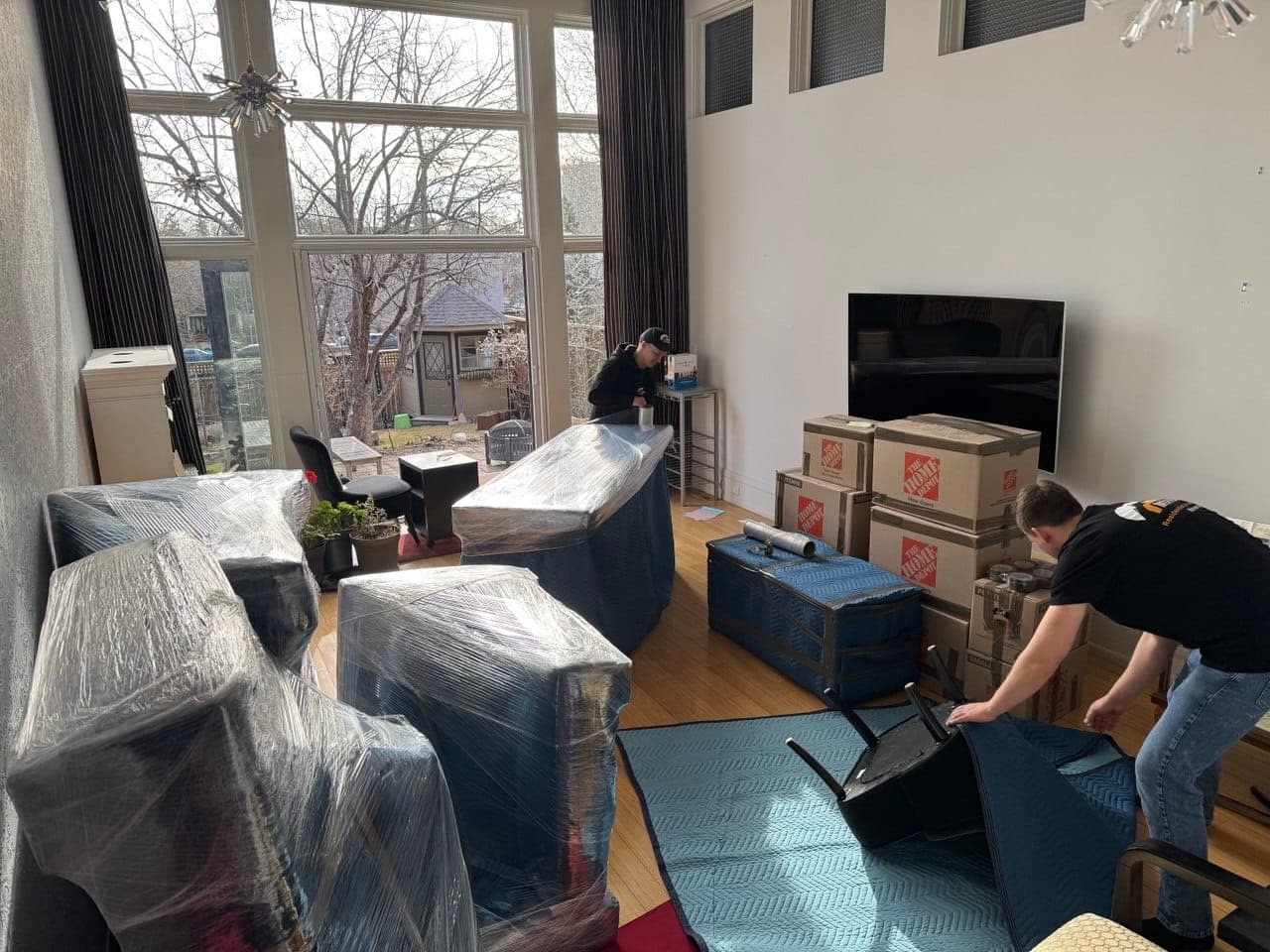 Edmonton apartment movers loading a truck on moving day