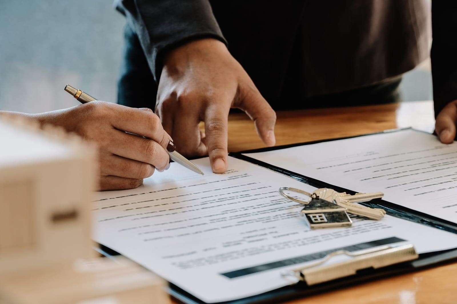 Landlord and tenant discussing agreement terms